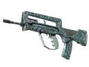 Souvenir FAMAS | Cyanospatter (Well-Worn)